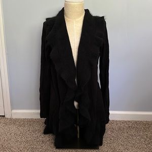 Beautiful and soft. Flattering in every way! This is a wardrobe must.